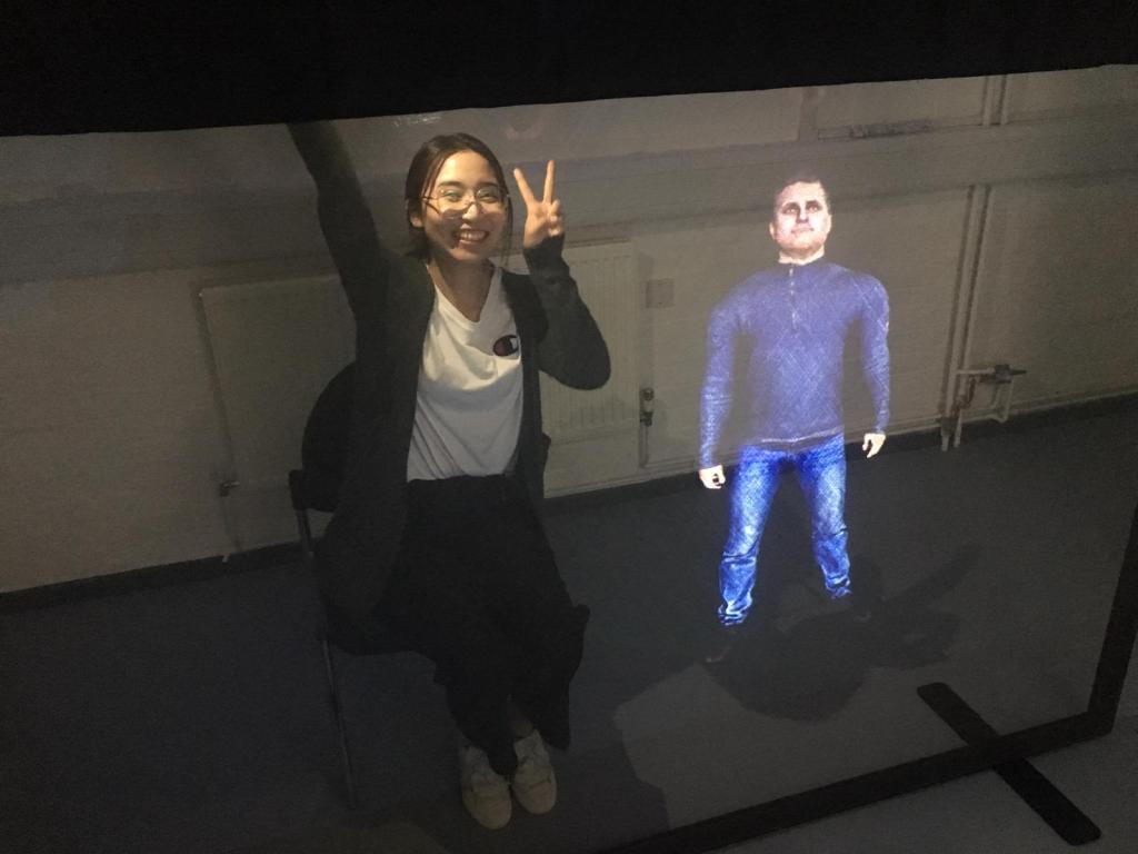 Interacting with a projection holographic AI.